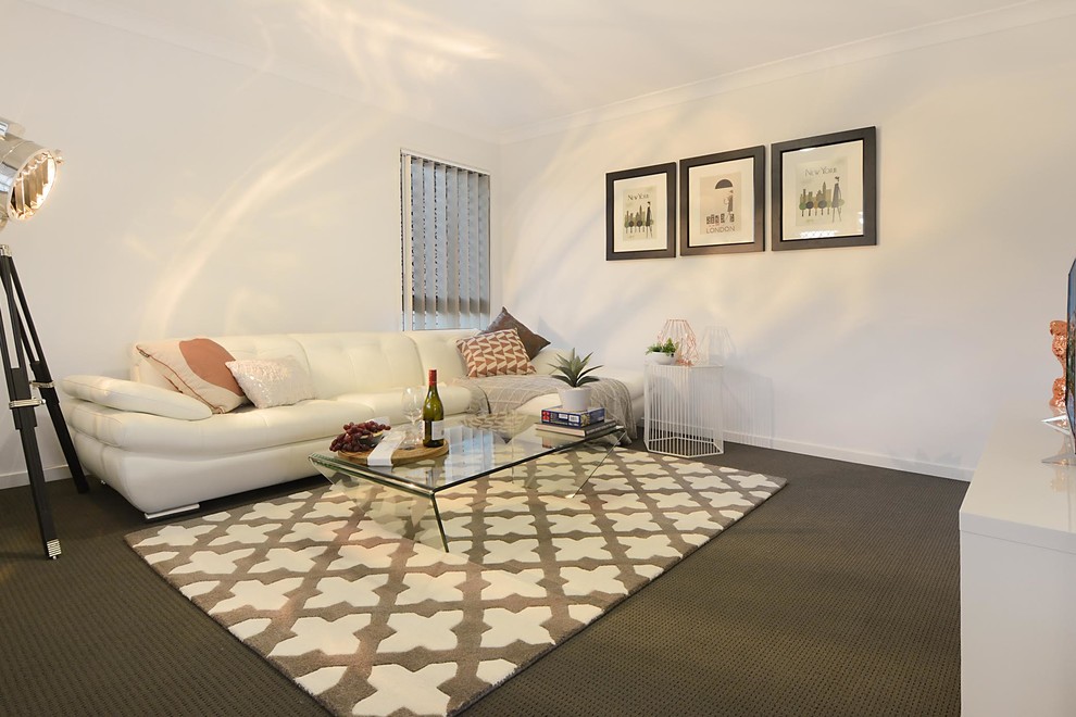 This is an example of a large contemporary open concept living room in Brisbane with white walls.