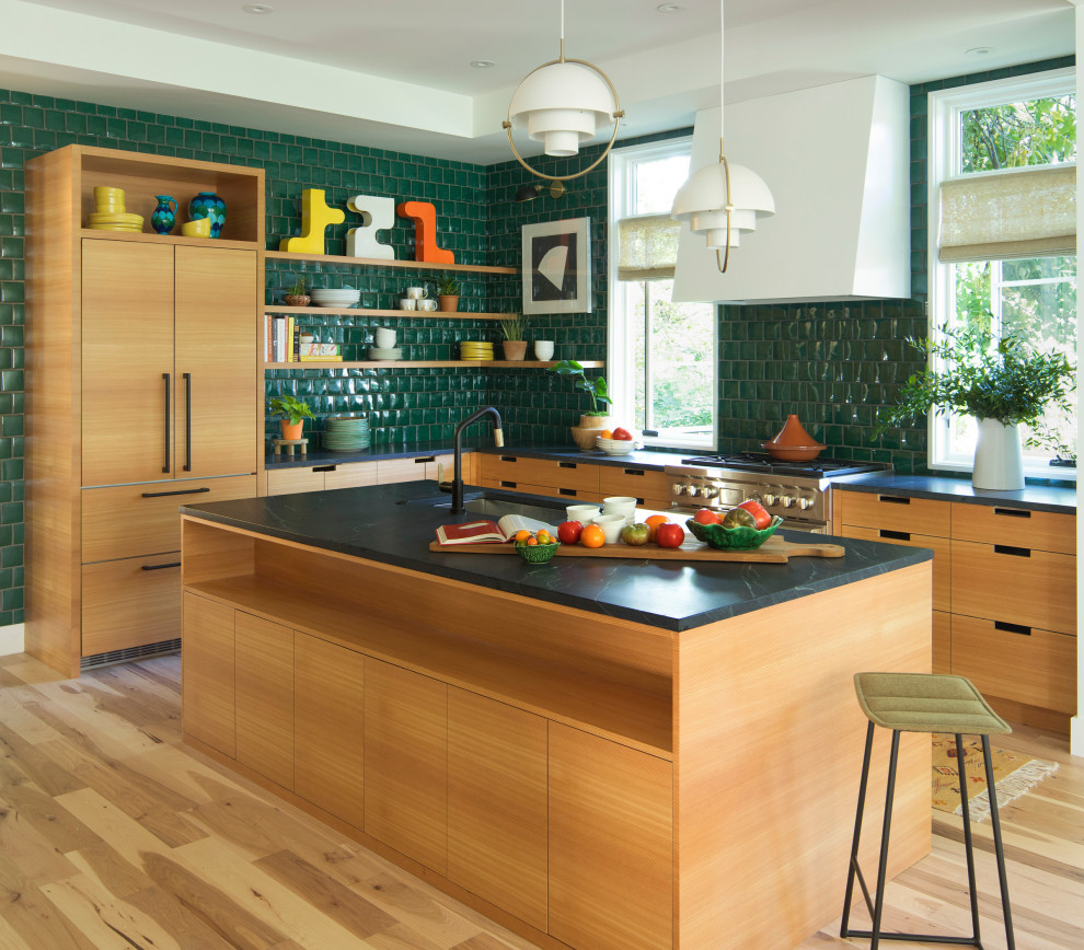 Small eclectic l-shaped eat-in kitchen in Minneapolis with flat-panel cabinets, light wood cabinets, soapstone benchtops and with island.