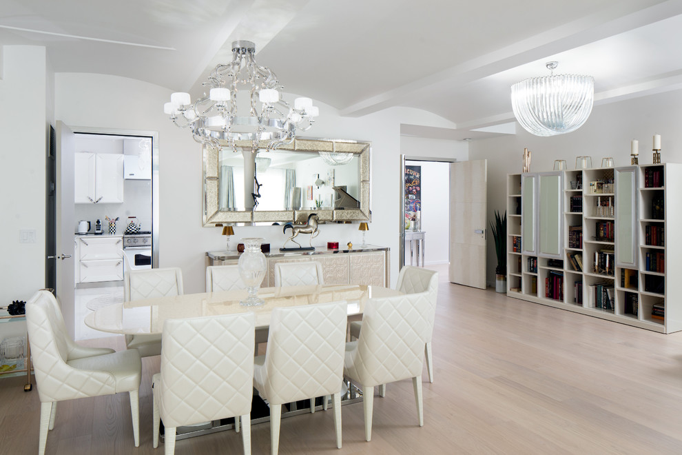 Large minimalist light wood floor and gray floor great room photo in New York with white walls