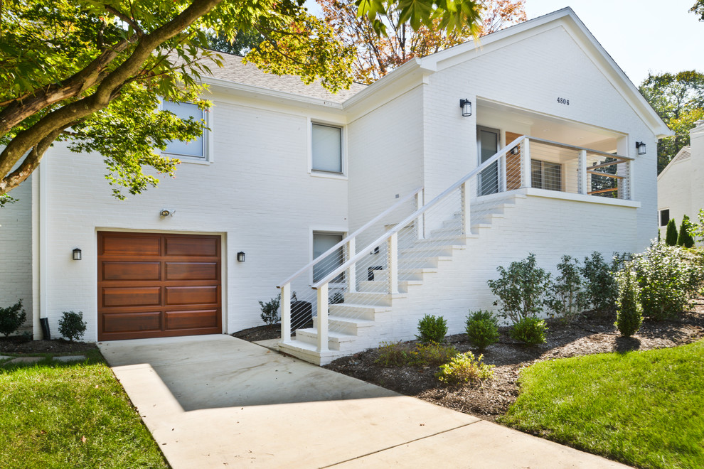 Inspiration for a huge modern white two-story mixed siding house exterior remodel in DC Metro