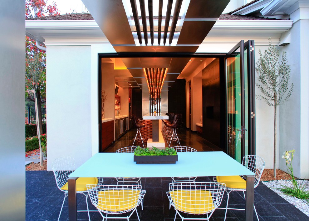 Photo of a contemporary patio in Los Angeles with a pergola.