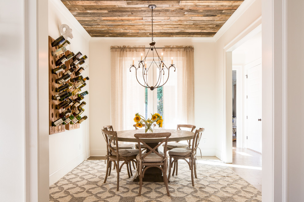 Inspiration for a mediterranean separate dining room in Atlanta with white walls.
