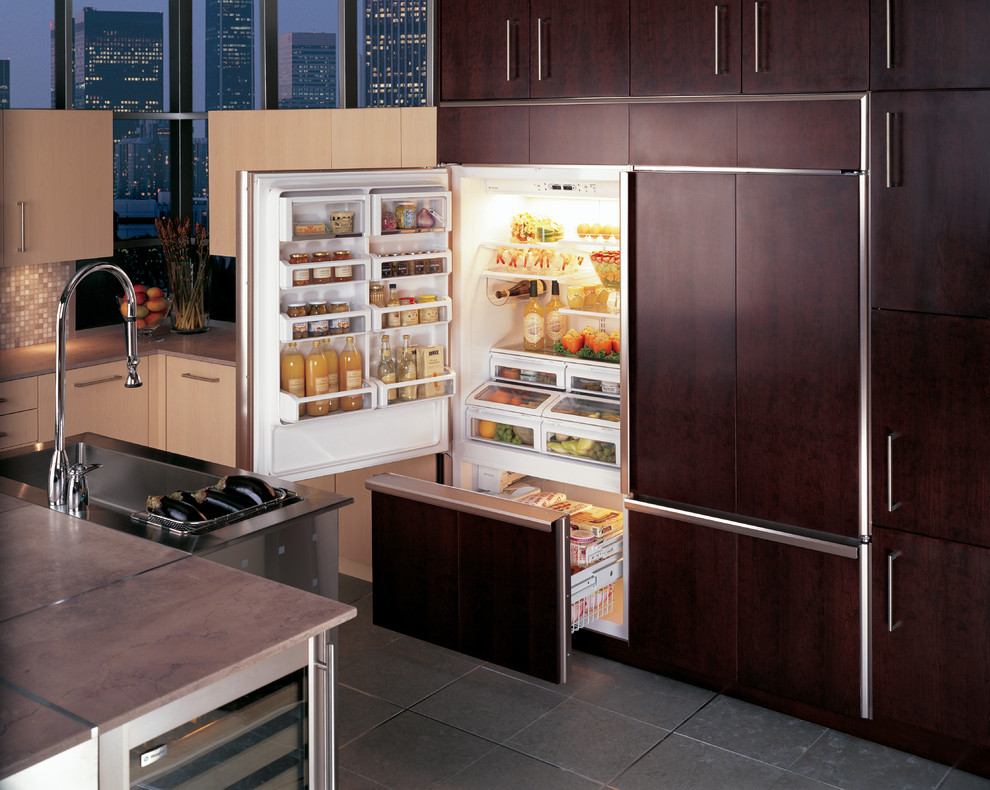 GE Monogram 36" built-in bottom-freezer refrigerators with custom panels