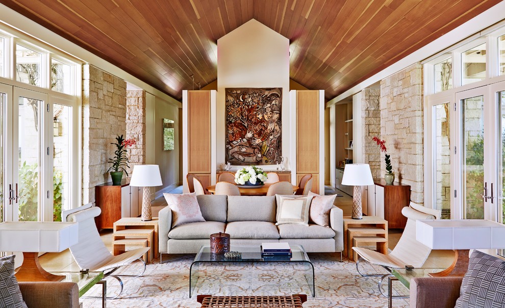Living room - mid-sized transitional formal and open concept porcelain tile living room idea in San Francisco with beige walls, a standard fireplace, a stone fireplace and no tv