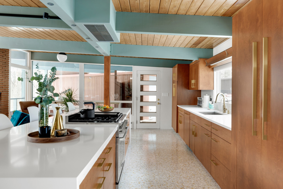 Design ideas for a mid-sized midcentury eat-in kitchen in Minneapolis with an undermount sink, flat-panel cabinets, brown cabinets, quartz benchtops, white splashback, engineered quartz splashback, panelled appliances, terrazzo floors, with island, white floor, white benchtop and exposed beam.