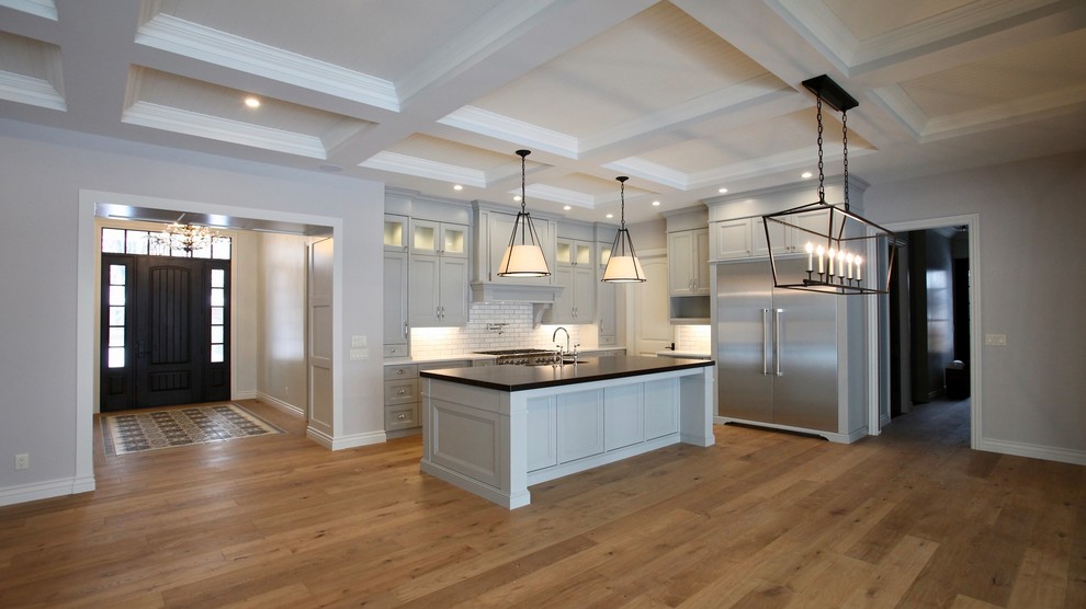 Example of a transitional kitchen design in Toronto
