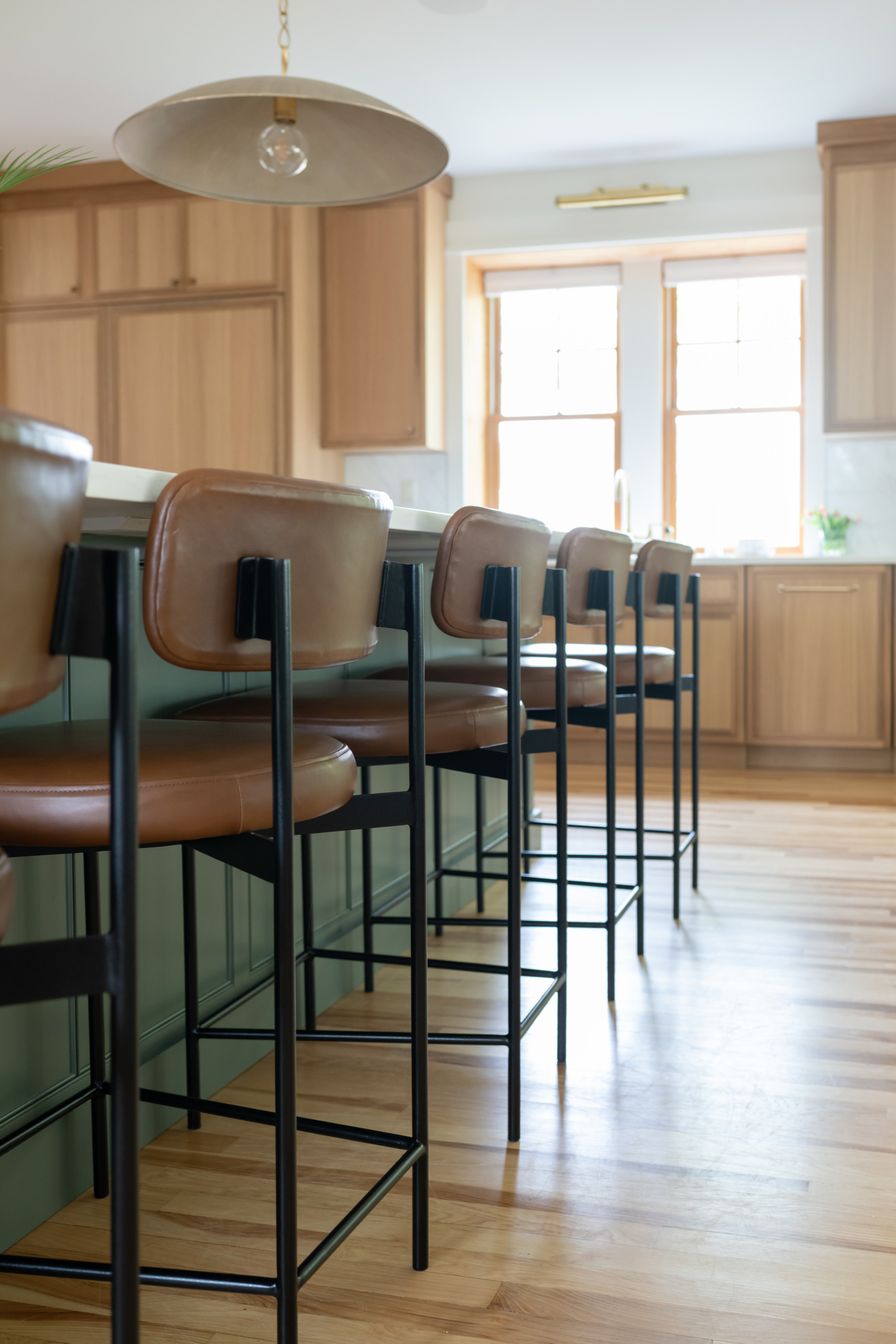 Warm Modern Kitchen Renovation with Natural Oak & Green Accents