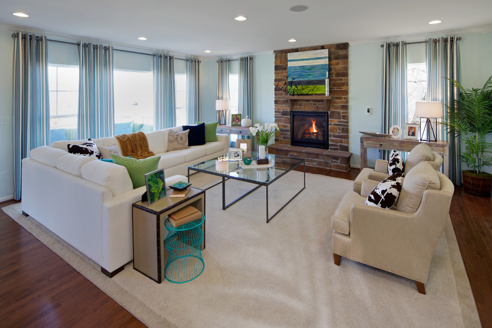 Design ideas for a contemporary living room in DC Metro with a stone fireplace surround.