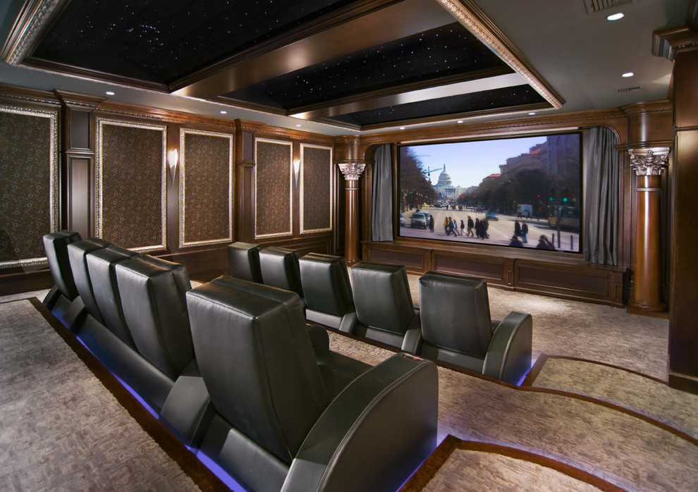 Traditional home theatre in Other with a projector screen and grey floor.