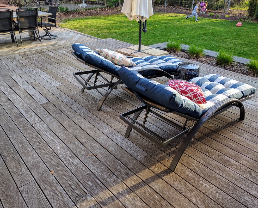 Example of a mid-sized arts and crafts backyard home design design