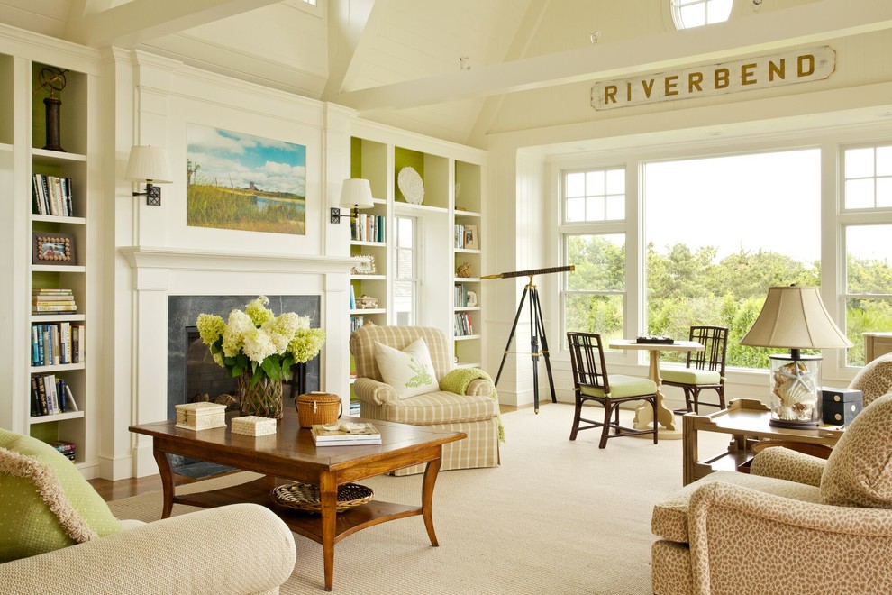 Design ideas for a beach style open concept living room in Boston with white walls, a standard fireplace and no tv.