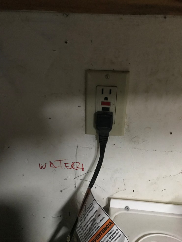 Ungrounded outlet tripping help!