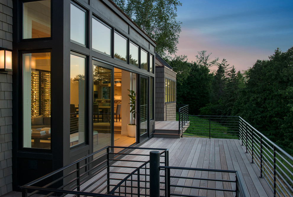 Design ideas for an expansive modern backyard deck in Minneapolis with no cover.