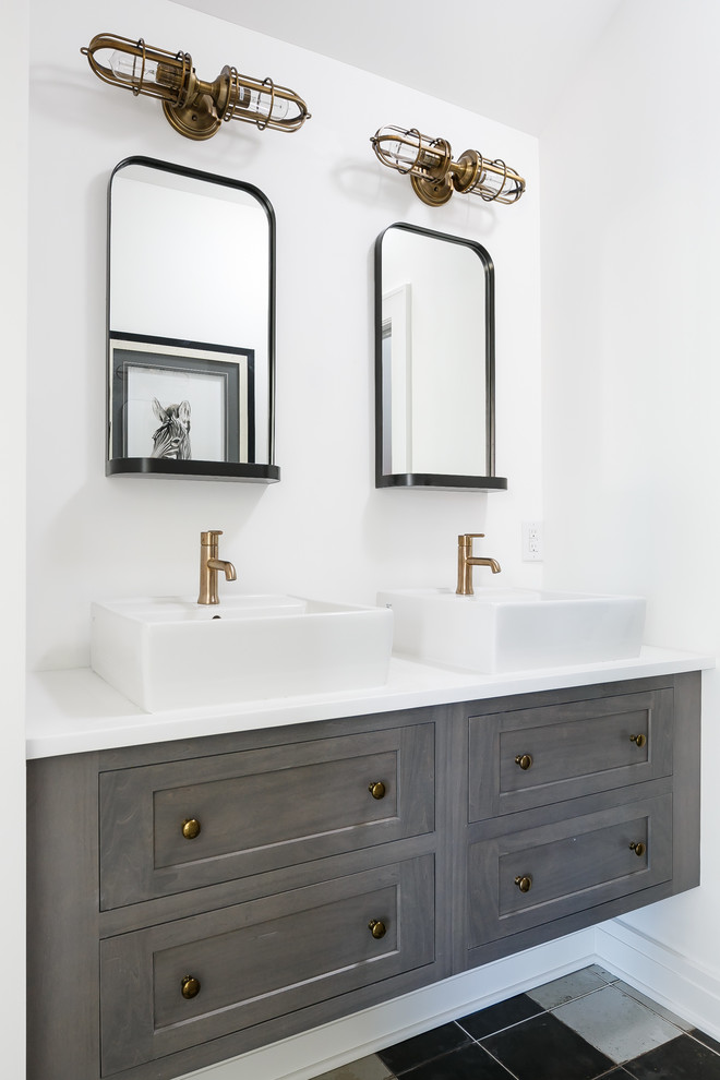 Inspiration for a mid-sized transitional kids bathroom in Louisville with flat-panel cabinets, grey cabinets, an alcove tub, a shower/bathtub combo, a two-piece toilet, black and white tile, cement tile, white walls, ceramic floors, a vessel sink and engineered quartz benchtops.