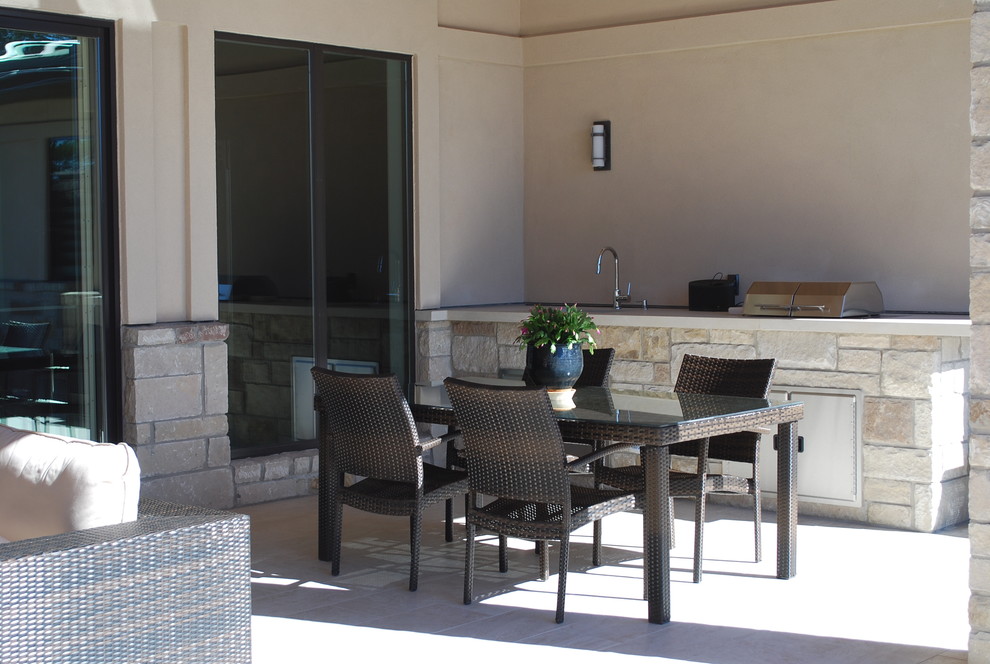 Covered patio with grill and sink