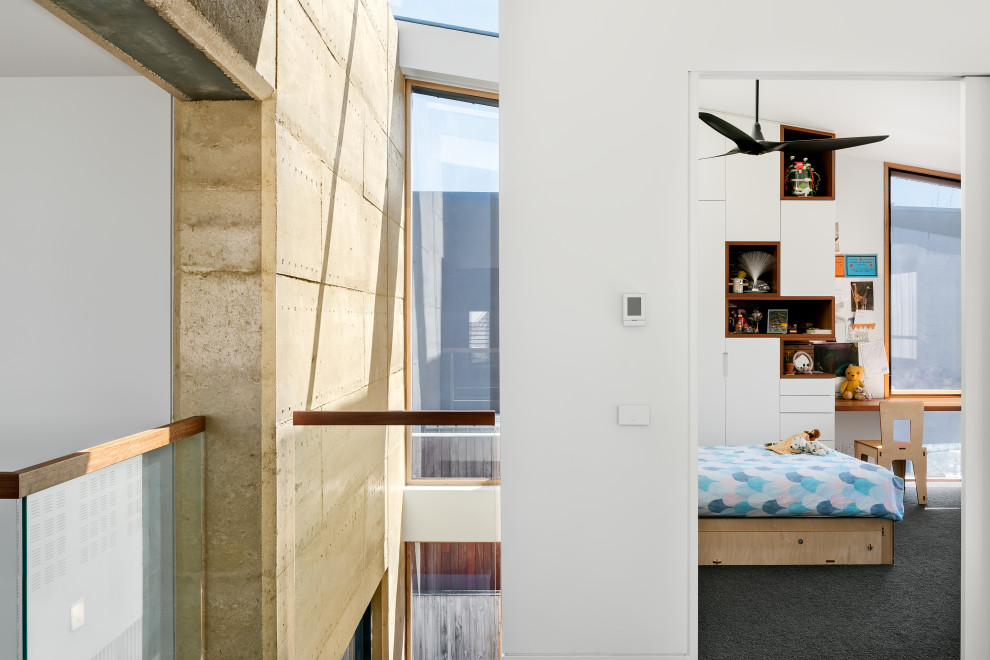 Design ideas for an expansive contemporary kids' room in Melbourne.