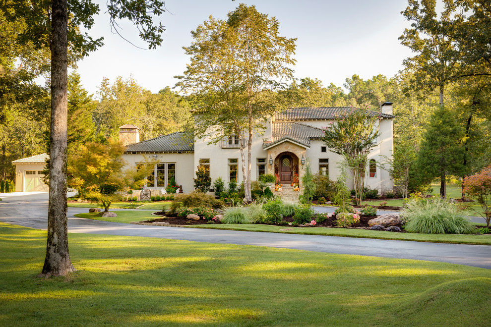 Design ideas for a large country home design in Little Rock.