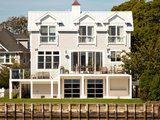 Beach Style Exterior by Merrick Construction, Inc.