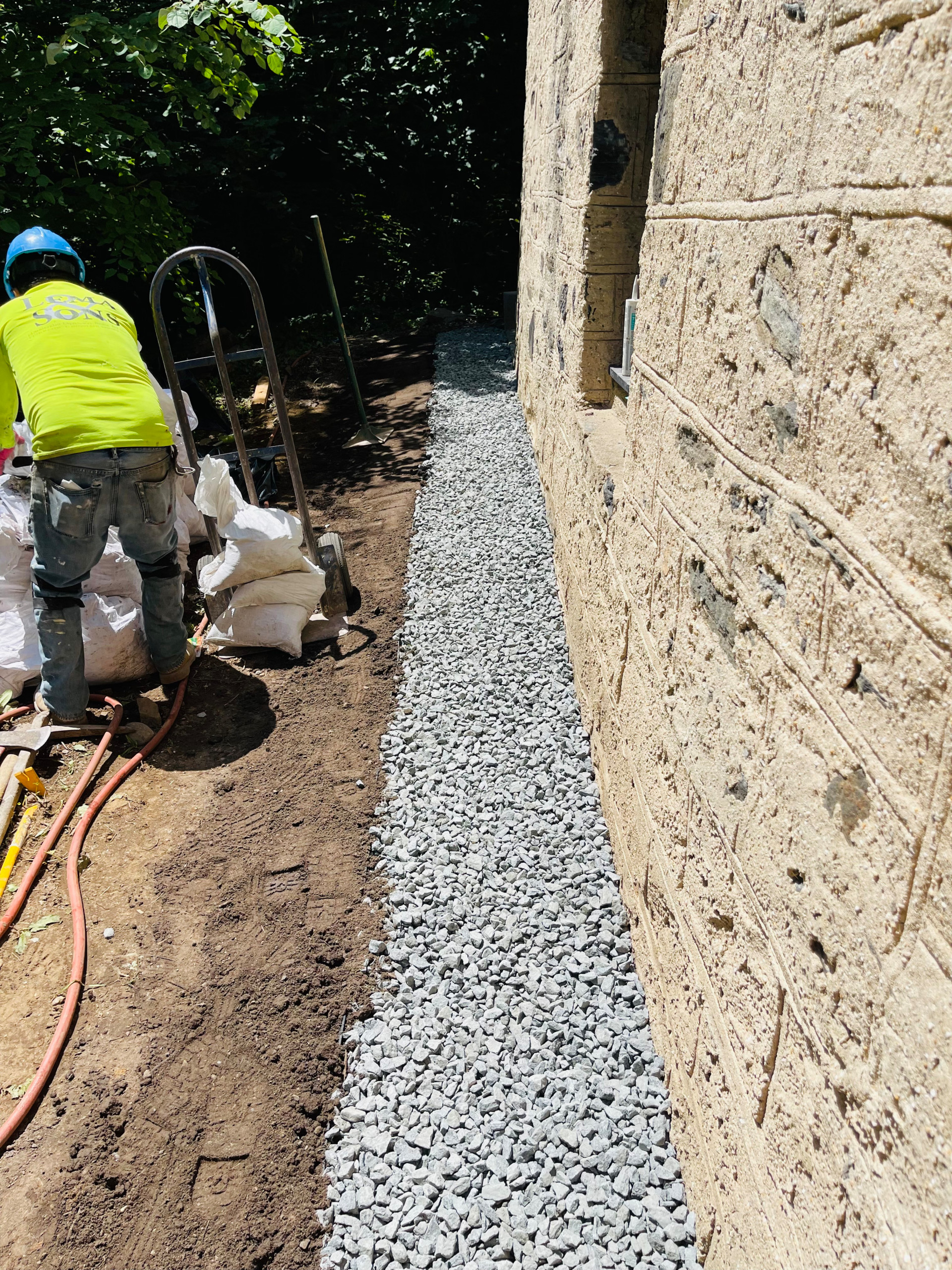 Curb/Exterior Wall Stucco/ParaPro Flashing/Garage slab replacement/Drainage
