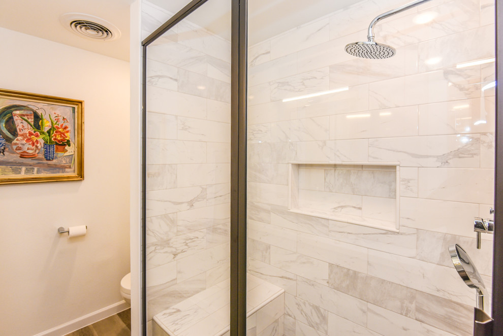 Inspiration for a mid-sized contemporary master white tile and marble tile porcelain tile and beige floor walk-in shower remodel in Houston with recessed-panel cabinets, white cabinets, white walls, a vessel sink, quartzite countertops and a hinged shower door