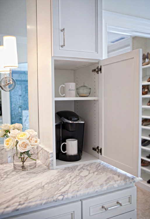 Inspiration for a large timeless master marble floor drop-in bathtub remodel in Raleigh with an undermount sink, beaded inset cabinets, white cabinets, marble countertops, a two-piece toilet and white walls