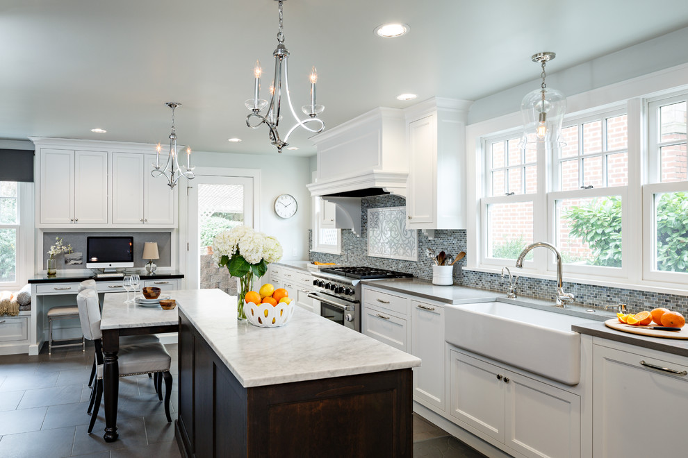 Photo of a traditional kitchen in Portland with a farmhouse sink and with island.
