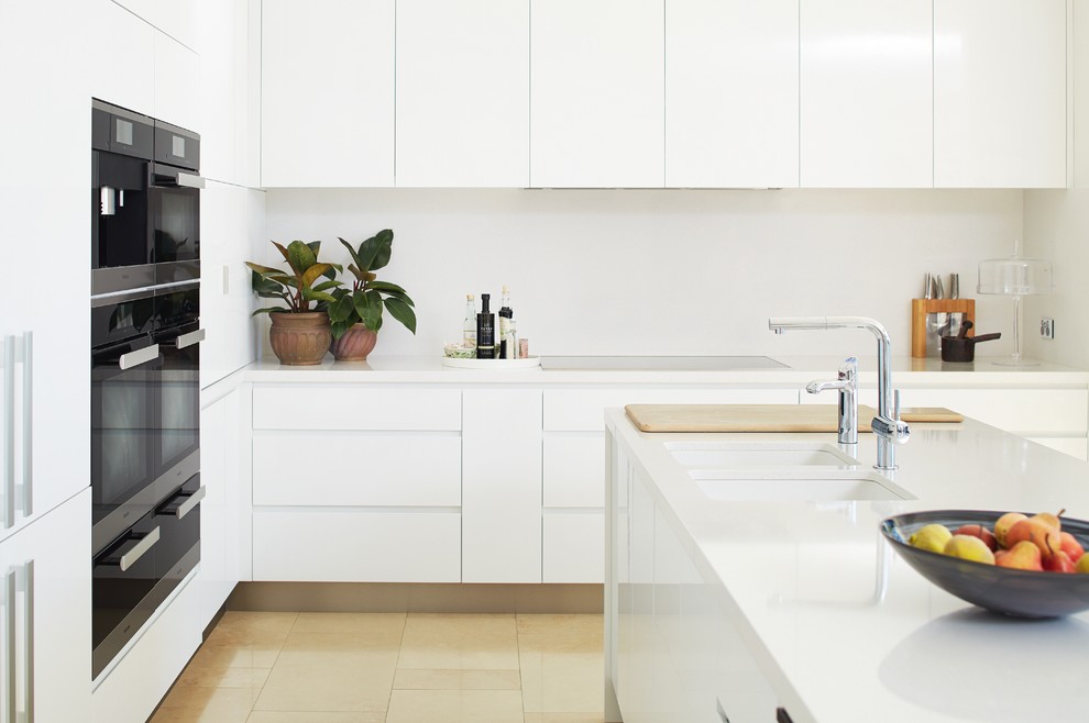 Inspiration for a contemporary kitchen in Perth with an undermount sink, flat-panel cabinets, white cabinets, stainless steel appliances and with island.