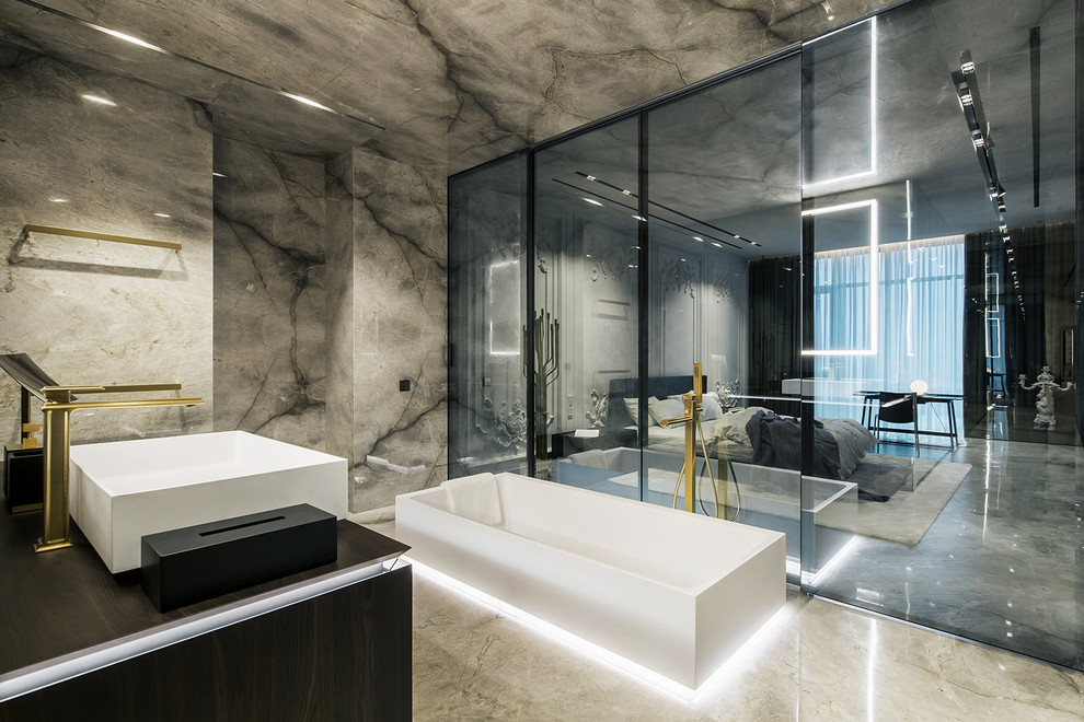 Design ideas for a contemporary master bathroom in Miami with black cabinets, a freestanding tub, gray tile, a vessel sink, grey floor and black benchtops.