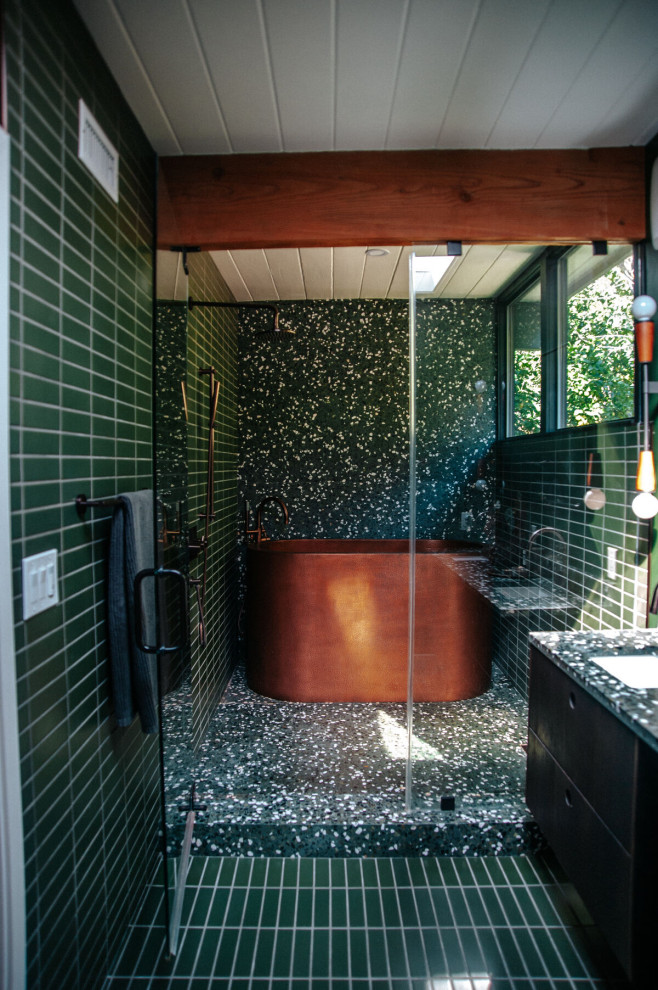 Photo of a small midcentury bathroom in Los Angeles with green tile, ceramic tile and green walls.