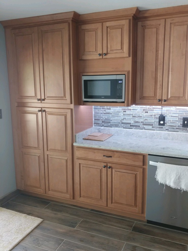 Example of a transitional kitchen design in Albuquerque