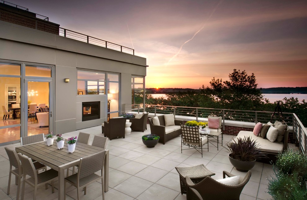 Contemporary rooftop and rooftop deck in DC Metro with a fire feature.