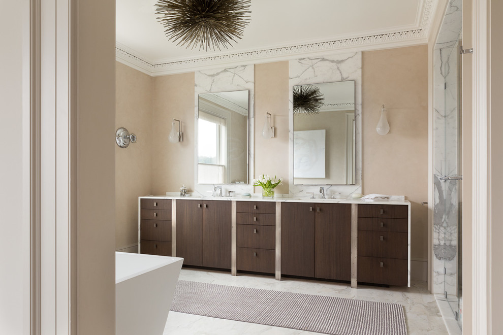 Design ideas for a transitional bathroom in San Francisco with flat-panel cabinets, dark wood cabinets, a freestanding tub, an alcove shower, white tile and beige walls.