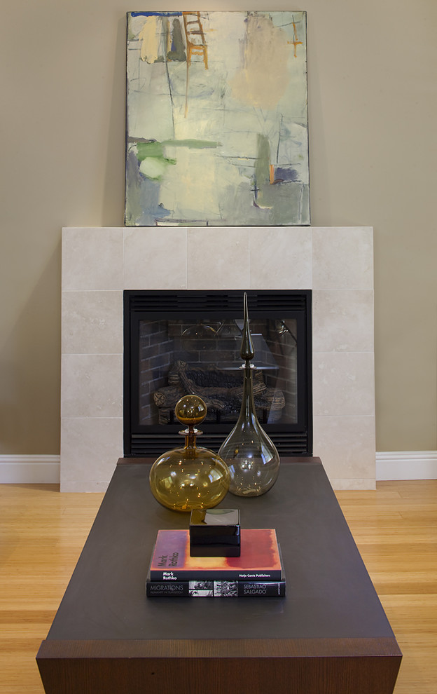 Inspiration for a contemporary living room in Dallas with bamboo floors and a tile fireplace surround.