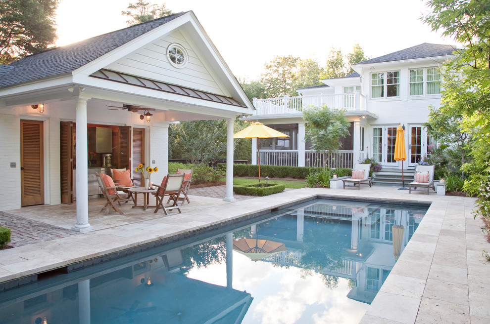 This is an example of a traditional rectangular pool in San Francisco with a pool house.