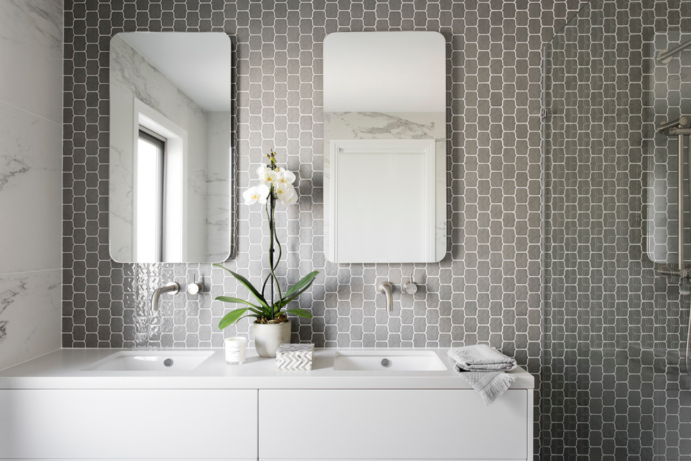 Inspiration for a small contemporary master bathroom in Melbourne with a wall-mount toilet, white walls, ceramic floors, an undermount sink and an open shower.