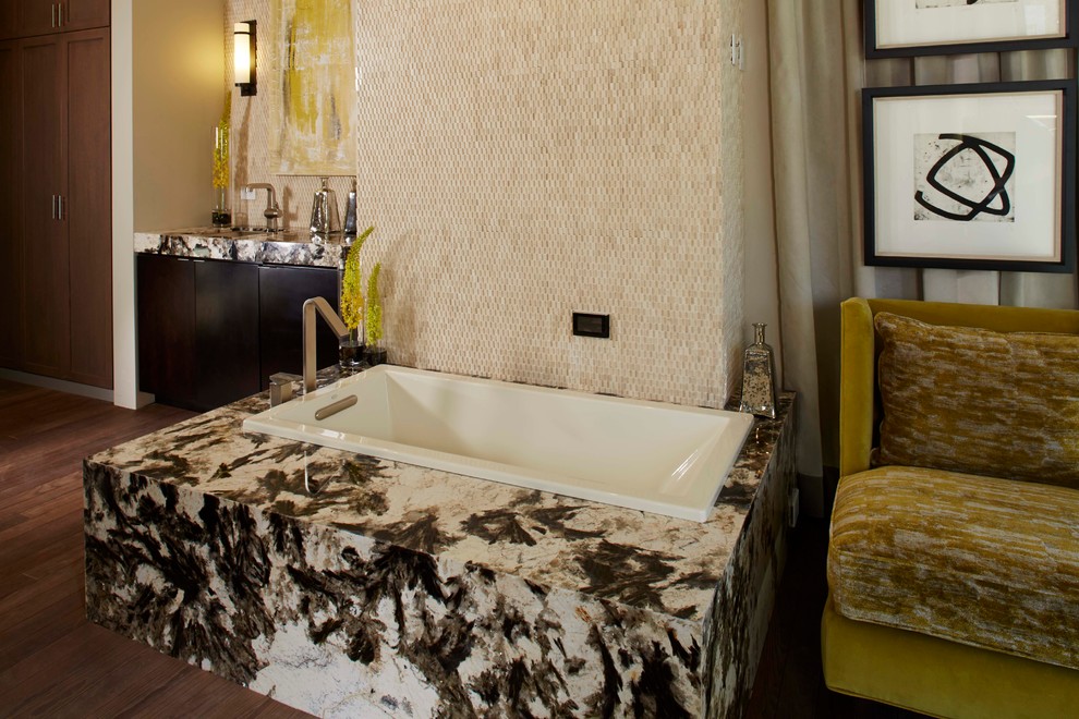 Example of a mid-sized eclectic master multicolored tile and stone tile medium tone wood floor bathroom design in Phoenix with flat-panel cabinets, dark wood cabinets, an undermount tub, beige walls, an integrated sink and tile countertops