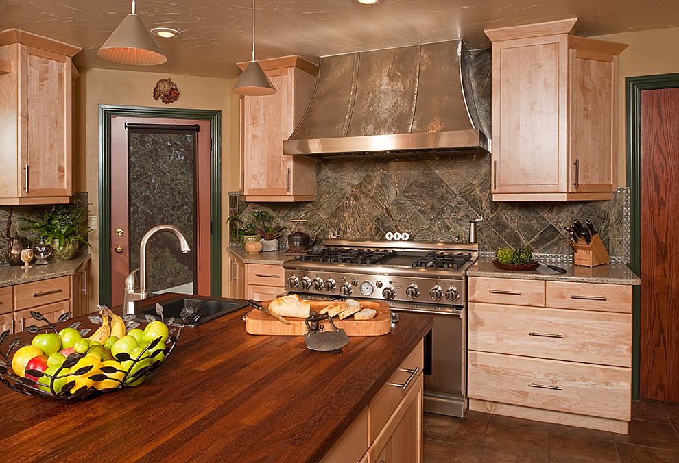 Large transitional u-shaped porcelain tile open concept kitchen photo with an undermount sink, recessed-panel cabinets, light wood cabinets, quartz countertops, green backsplash, stone tile backsplash, stainless steel appliances and beige walls