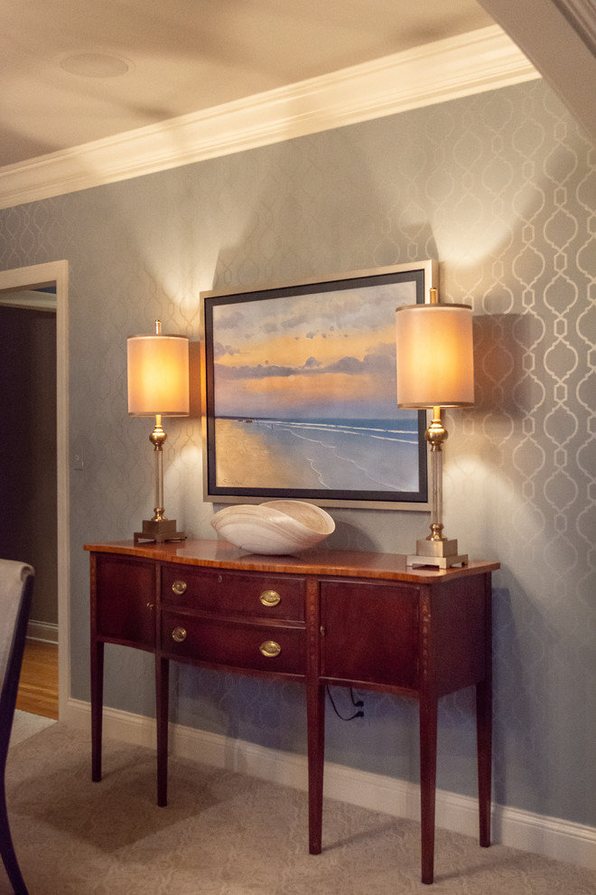 Example of a mid-sized transitional carpeted and beige floor enclosed dining room design with beige walls