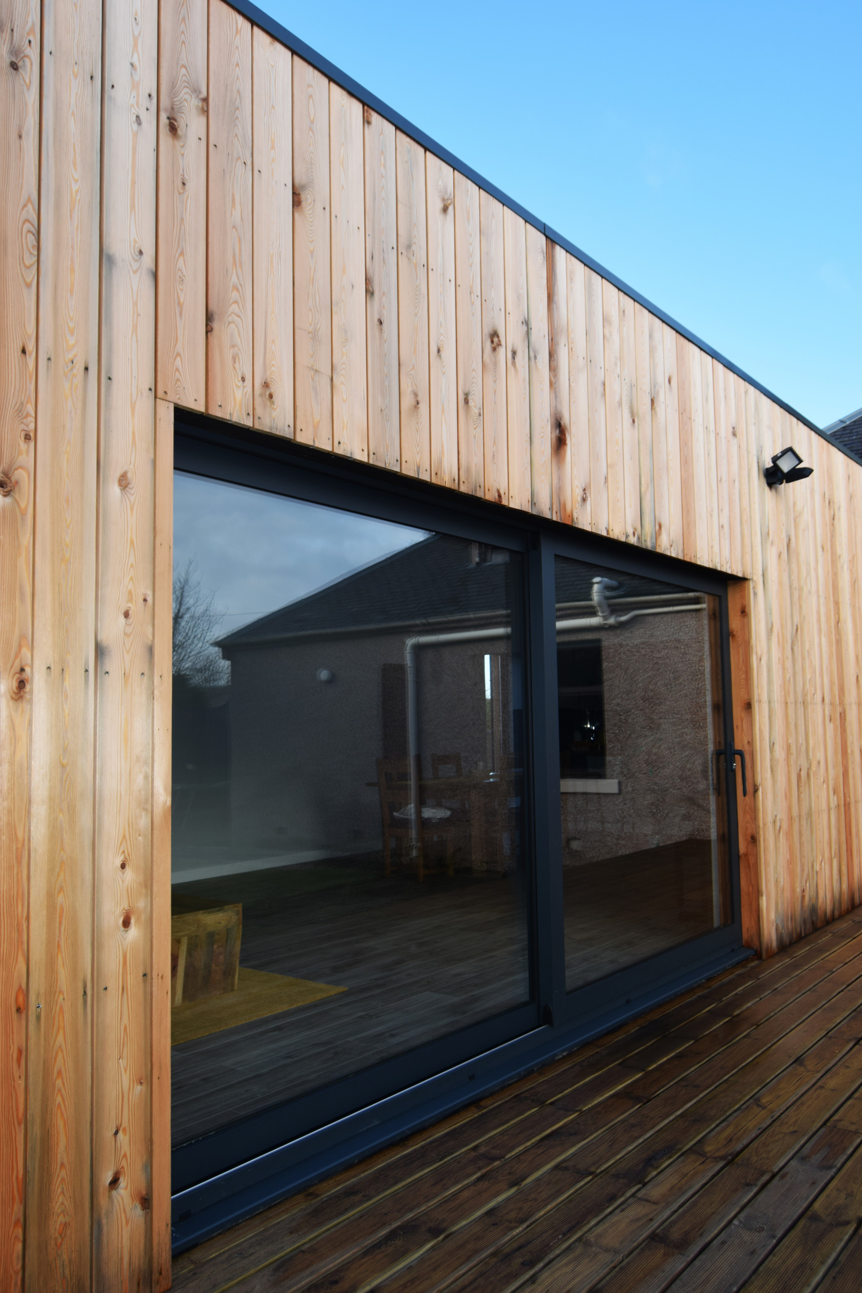 Timber Clad Extension to House
