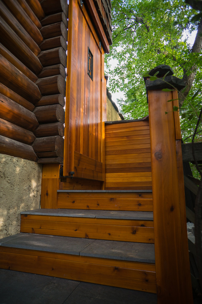 Inspiration for a rustic staircase remodel in Calgary