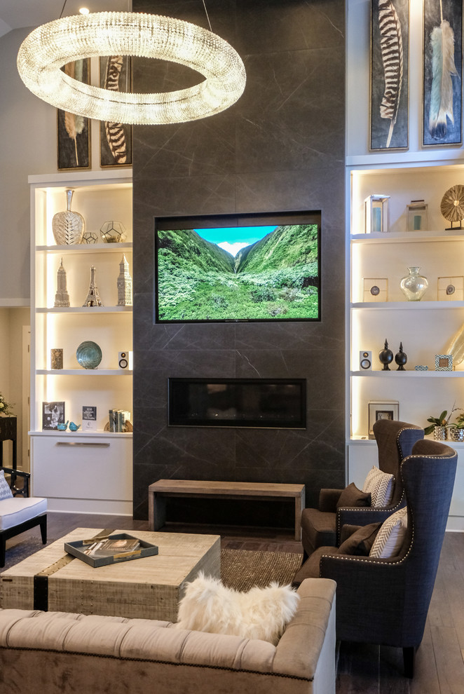 Design ideas for a large contemporary open concept living room in Other with grey walls, dark hardwood floors, a standard fireplace, a tile fireplace surround and a wall-mounted tv.