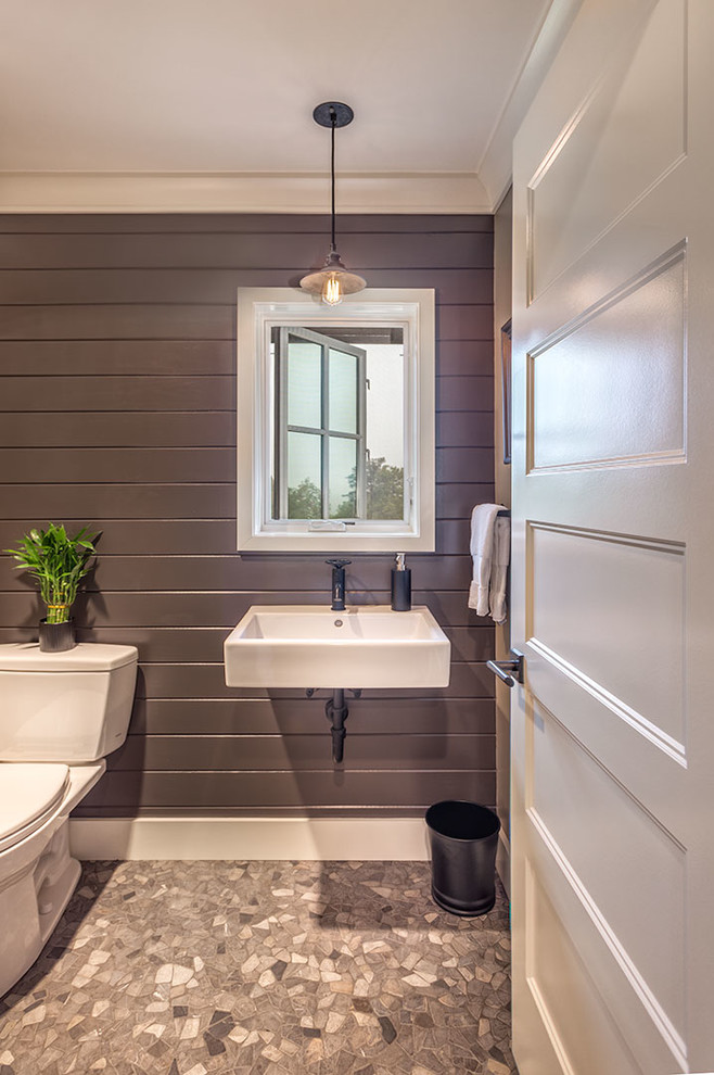 Design ideas for a transitional powder room in Other.