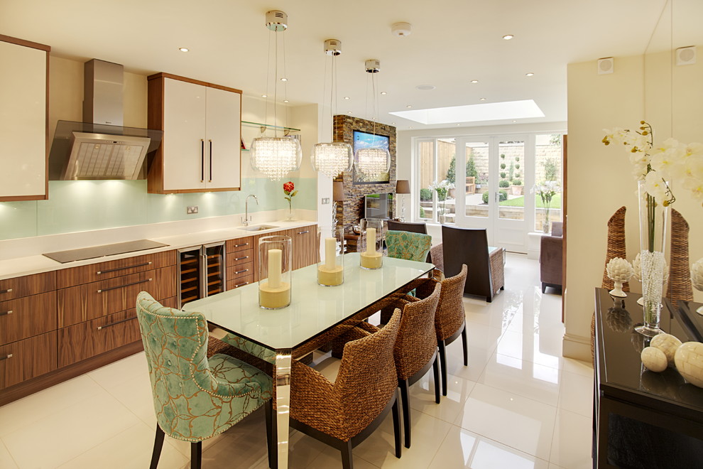 Photo of a large transitional galley eat-in kitchen in Other with a single-bowl sink, flat-panel cabinets, medium wood cabinets, granite benchtops, beige splashback, ceramic splashback, stainless steel appliances, ceramic floors and no island.
