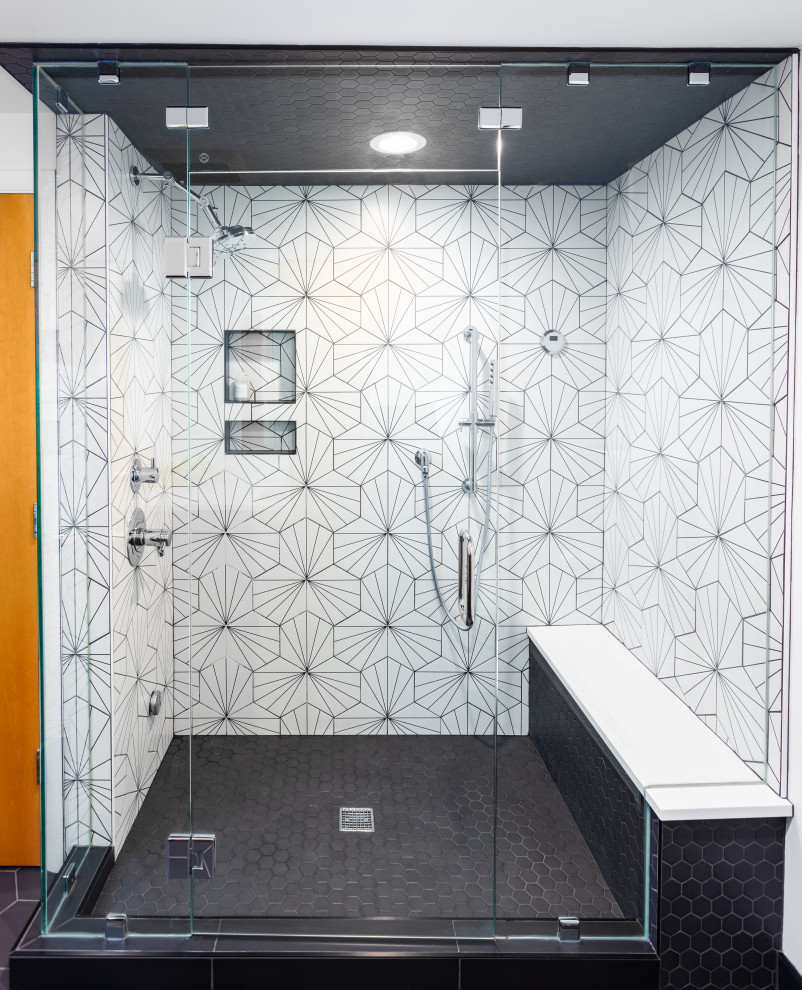 Inspiration for a large midcentury ensuite bathroom in Detroit with flat-panel cabinets, brown cabinets, an alcove shower, a one-piece toilet, black and white tiles, ceramic tiles, white walls, ceramic flooring, a submerged sink, quartz worktops, black floors, a hinged door, white worktops, double sinks and a floating vanity unit.