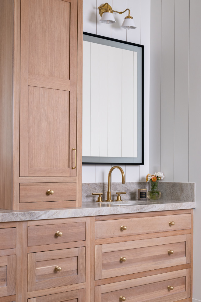 Freestanding bathtub - large transitional master porcelain tile, beige floor, double-sink and shiplap wall freestanding bathtub idea in Orange County with shaker cabinets, distressed cabinets, a one-piece toilet, white walls, an undermount sink, quartzite countertops, a hinged shower door, multicolored countertops, a niche and a built-in vanity