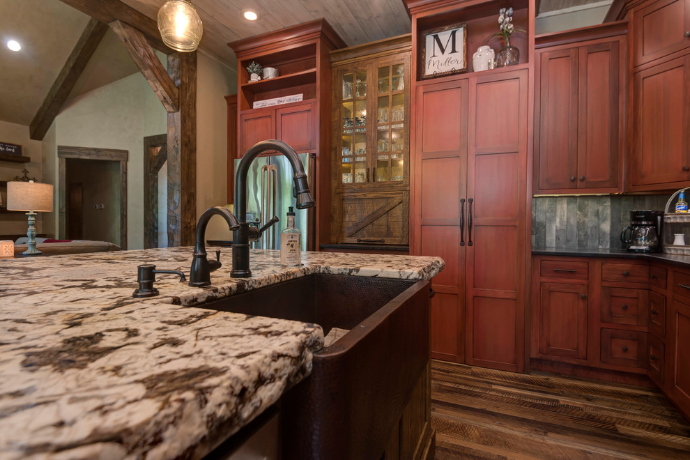 Inspiration for a large rustic kitchen remodel with shaker cabinets, medium tone wood cabinets and an island
