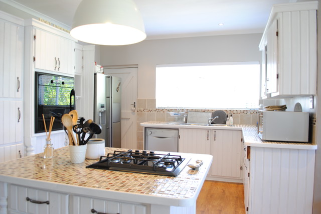 Example of an eclectic home design design in Other