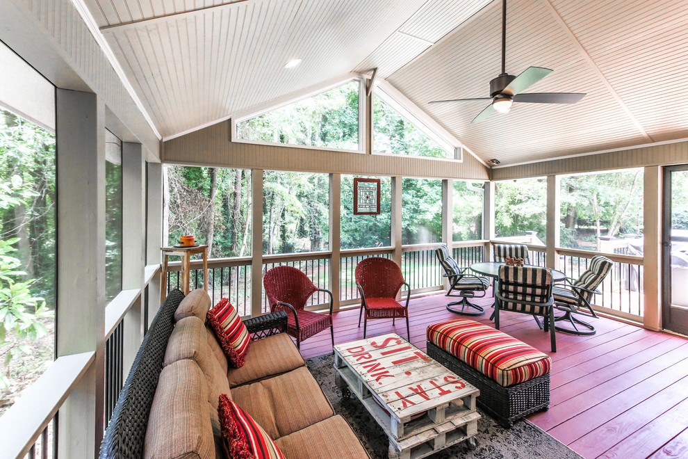 Large country sunroom in Atlanta with painted wood floors, no fireplace and a standard ceiling.