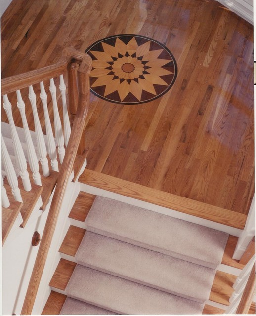 custom white oak wood flooring job with wood flooring medallion