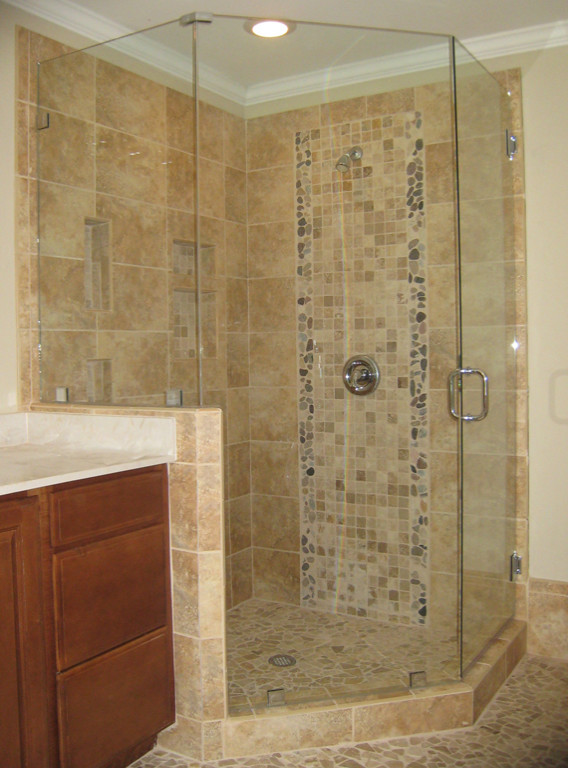 This is an example of a transitional bathroom in Charlotte with medium wood cabinets, beige tile and beige walls.
